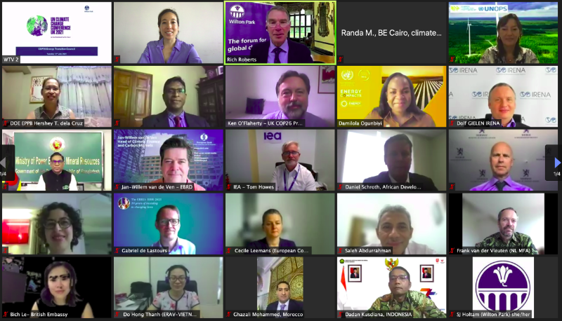 An online meeting from the Energy Transition Council, shows many people in the meeting on webcams. 