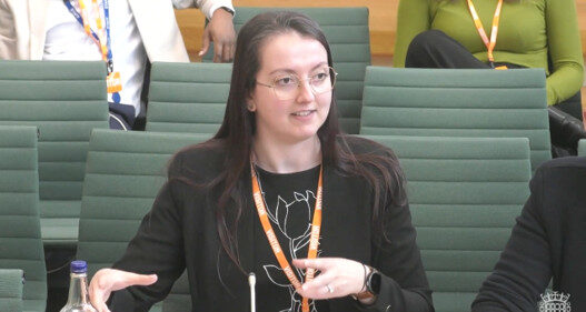 Alycia Leonard speaking at the Committee
