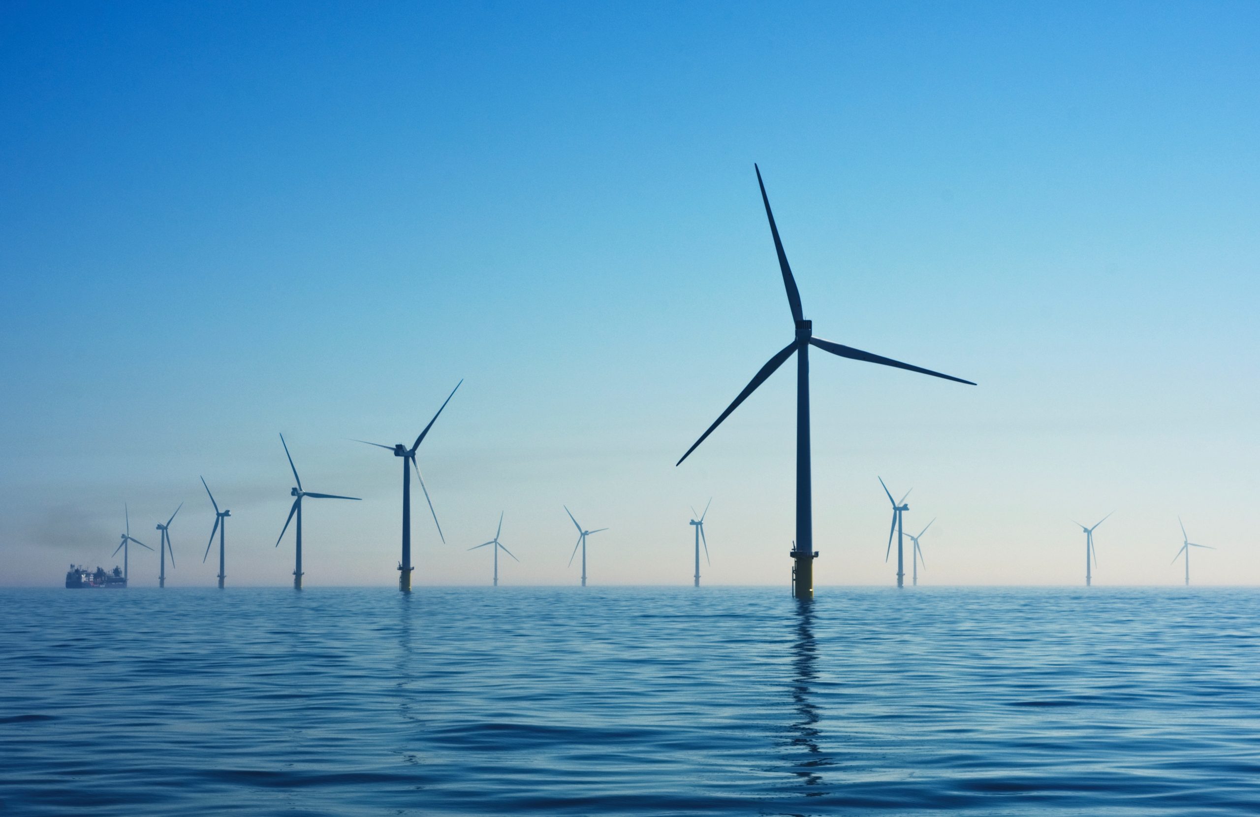 Offshore wind farm, wind turbines out at sea